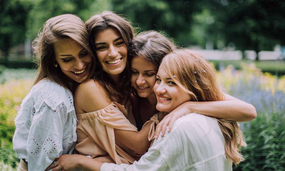 Friends Hugging Each Other Shot